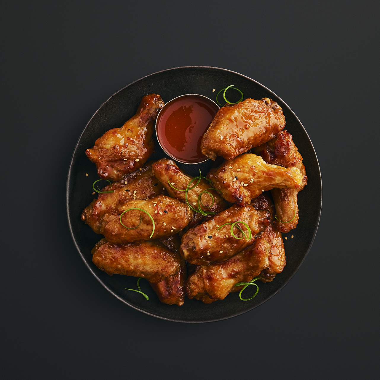 Plats d'ailes de poulet miel et ail