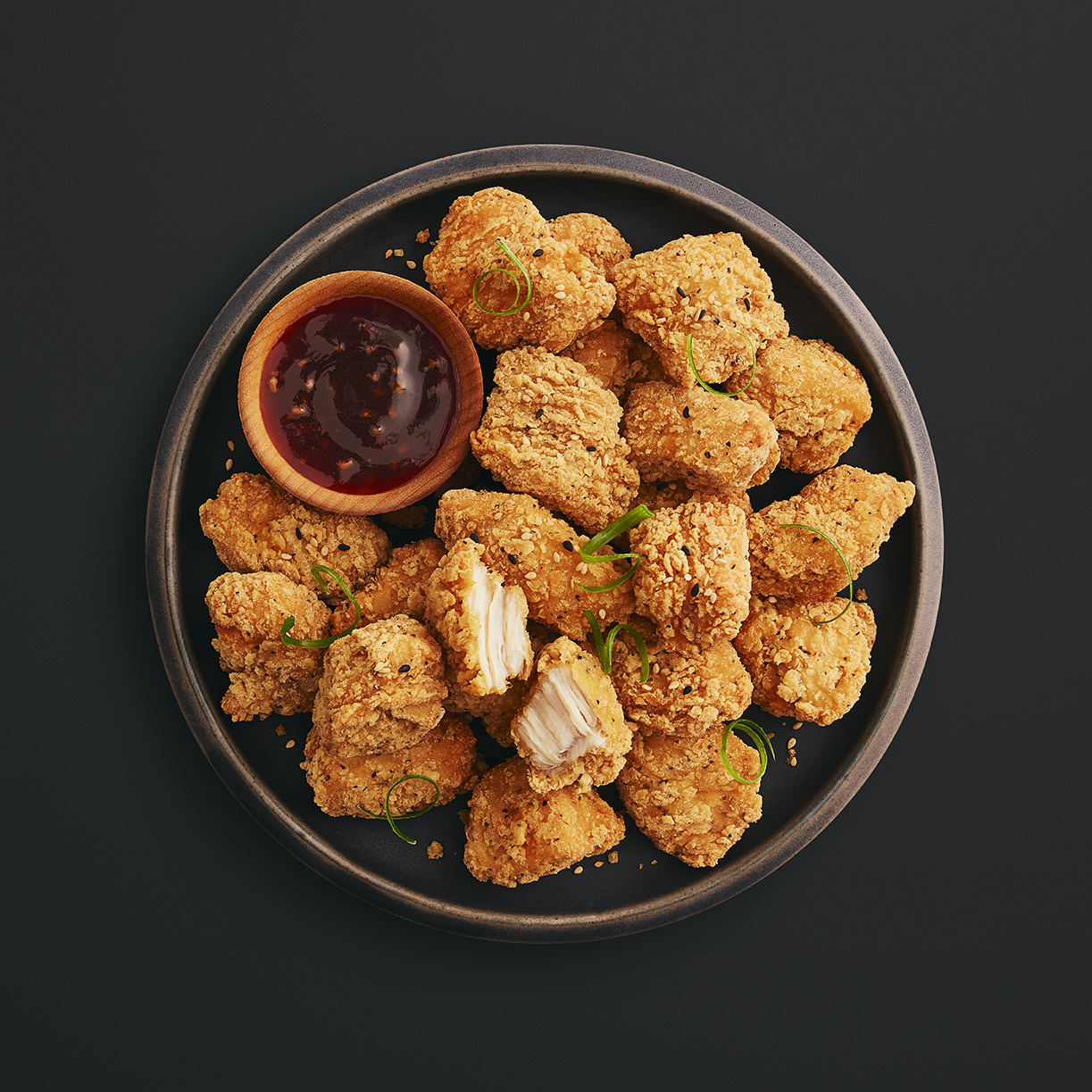 Morceaux de poulet avec sauce saveur miel et ail